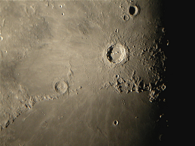 Moon using Nikon CoopPix w/25mm eypiece and LX200GPS 10; 7-8-03