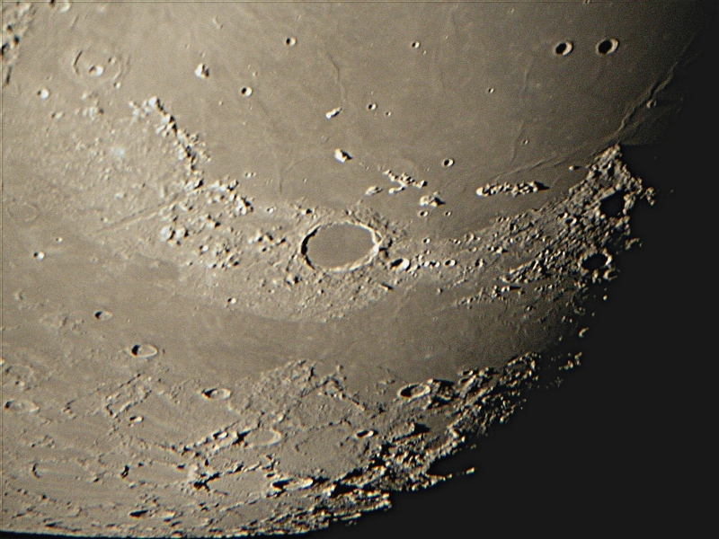 Moon using Nikon CoopPix w/25mm eypiece and LX200GPS 10; 7-8-03